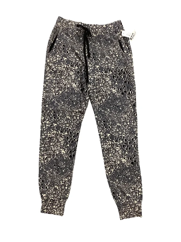 Bold plaid pants for eye-catching style choices -Pants Joggers By Sundry In Animal Print, Size: 2